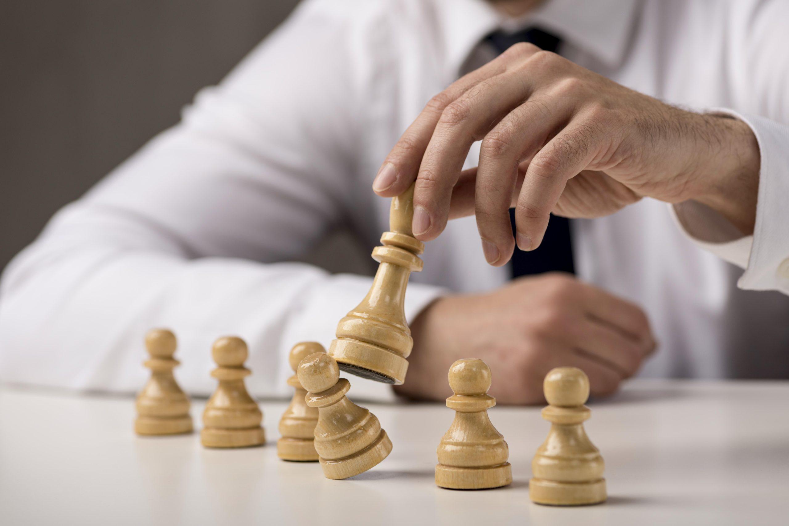 businessman-tumbling-pawn-with-king